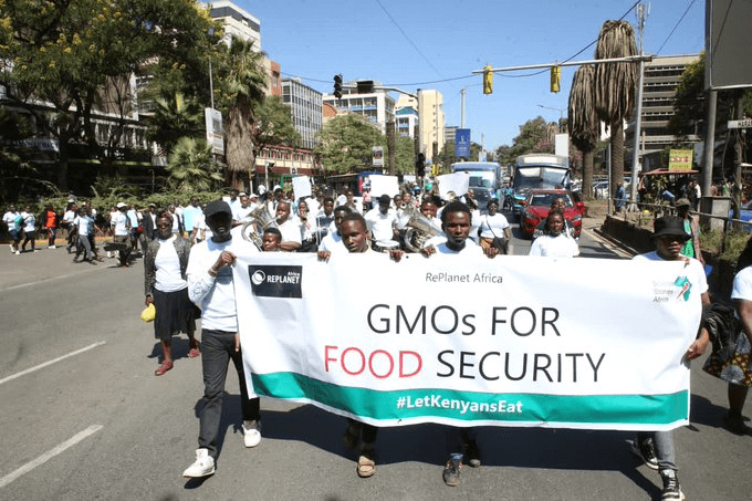Protesters march in support of GMOs